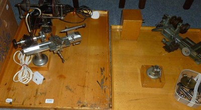 Lot 1080 - Two Watchmakers Lathes, in cast iron and steel, mounted on wooden boards, with accessories