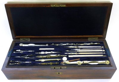 Lot 1085 - A 19th Century Rosewood Cased Draughtsman's Set, with two lift-out trays, containing ivory and...