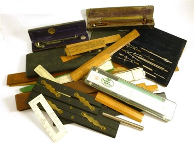 Lot 1089 - A Collection of Drawing Instruments, including boxwood rules, parallel rules, slide rules,...