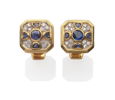 Lot 335 - ~ A Pair of Sapphire and Diamond Cufflinks, set with round cut and semi-circle sapphires and...