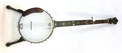 Lot 1148 - A Windsor Premier Model 3 Four String Banjo, with open back, 10 1/2inch head, mother of pearl...