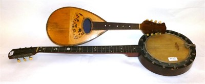 Lot 1152 - A Zither Banjo by W Dennis, with an ebonised resonator, 20cm velum head, mahogany neck, mother...