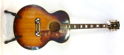 Lot 1156 - A Gibson J200 Acoustic Guitar, serial number 62438, circa 1963, spruce top, maple back and...