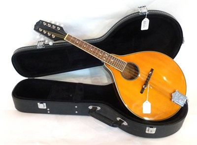 Lot 1159 - An Ozark Flat Back Mandolin, with mahogany back and sides, spruce top, white plastic tuners, in...