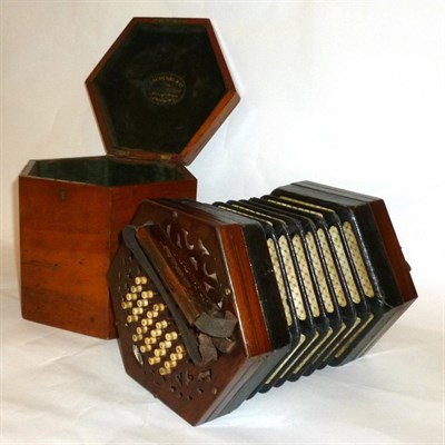 Lot 1177 - A Lachenal Forty Six Key Anglo System Concertina, serial number 3415, with rosewood fretwork...