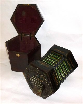 Lot 1178 - A Forty Eight Key English System Concertina, the rosewood fretwork ends inset with silver...