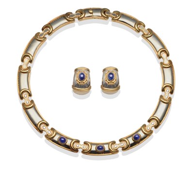 Lot 345 - ~ A Sapphire and Diamond Collar, of curved white links within yellow borders, three cabochon...