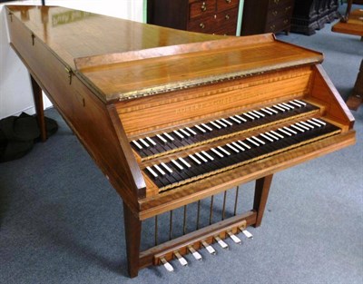 Lot 1180 - A Walnut Cased Harpsichord by Robert Goble 1958, with ebony keys, seven pedals, dust cover,...