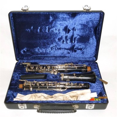 Lot 1183 - A Buffet Crampon Paris Oboe, serial number 2592, with nickel keys, accessories, in a plush...