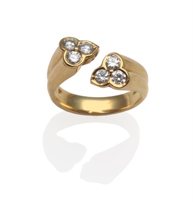 Lot 347 - An 18 Carat Gold Diamond Ring, by Kutchinsky, of torque style, each end inset with a trio of...