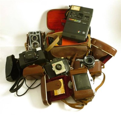 Lot 1231 - Cameras and Accessories, including a Zeiss Ikoflex, in a stitched leather case, Edixa Prismat, Agfa