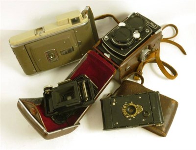 Lot 1238 - Four Cameras - Yashica-Mat twin lens reflex camera, serial number  MT11202396, in a leather...