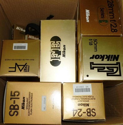 Lot 1242 - Boxed Nikon Cameras and Accessories, including a Nikon FE camera No.3461665, Nikon 601 AF...