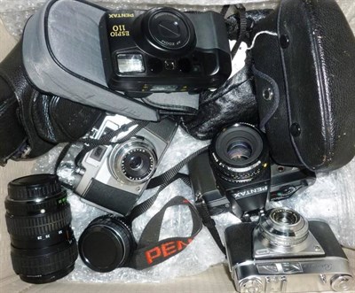 Lot 1243 - A Large Collection of Pentax Cameras and Accessories, including P30n with 50mm and 135mm...