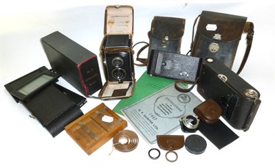 Lot 1251 - Cameras and Accessories, including a Rolleicord TLR camera in stitched leather case, two Kodak...