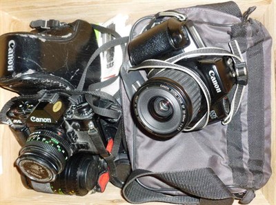 Lot 1255 - Canon Cameras and Accessories, including a Canon A-1 camera with f1.8/50mm FD lens, Canon AV-1 with