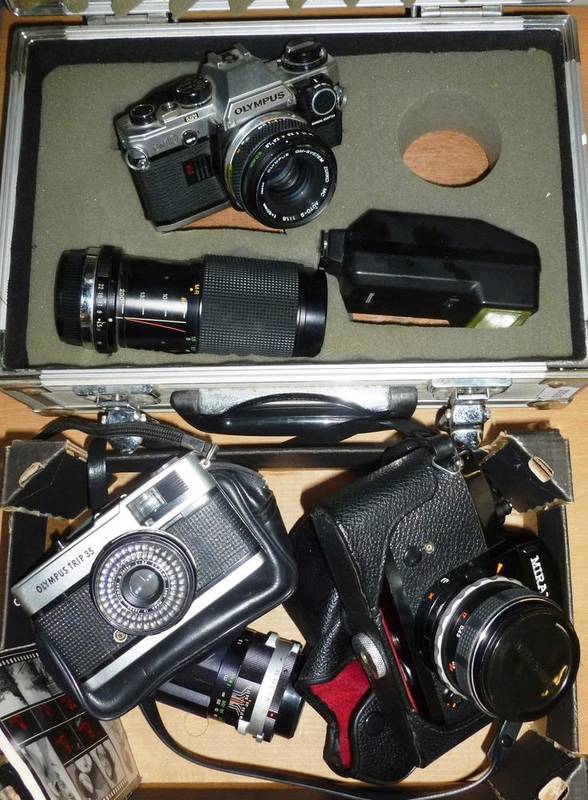 Lot 1256 - Three 35mm Cameras - Olympus Trip 35, Miranda RE-II with two lenses and Olympus OM10, with two...