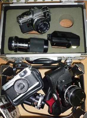 Lot 1256 - Three 35mm Cameras - Olympus Trip 35, Miranda RE-II with two lenses and Olympus OM10, with two...