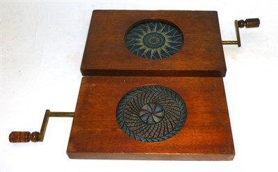 Lot 1271 - Two Mahogany Framed Mechanical Kaleidoscopic Magic Lantern Slides, with brass winding arms and...