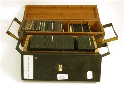 Lot 1273 - Two Boxes of Magic Lantern Slides, one box containing 1920's Russia including Stalin, Red Army...