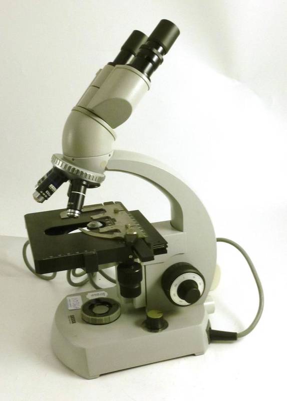 Lot 1036 - An Electrically Operated Grey Enamelled Binocular Microscope by Zeiss, West Germany, with...