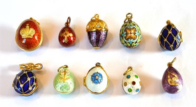 Lot 357 - ~ Nine Egg Charms and An Acorn Charm, enamelled in assorted colours, some set with white paste...