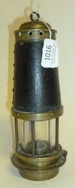 Lot 1016 - A Brass 'Bonneted Clanny' Miners Safety Lamp, fitted with and stamped 'Stokes's Shut Off', possibly