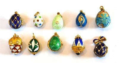 Lot 358 - ~ Nine Egg Charms and An Acorn Charm, enamelled in assorted colours, some set with white paste...