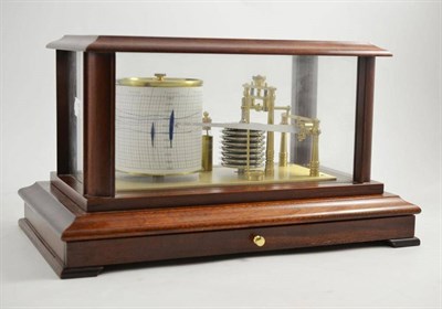 Lot 1024 - A Mahogany Cased Barograph by Russell of Norwich, with seven section vacuum, working clockwork...