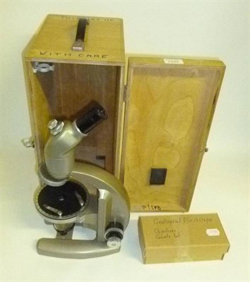 Lot 1033 - A Black Enamelled Monocular Compound Microscope by Bausch & Lomb, with rack and pinion coarse...