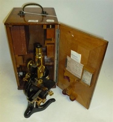 Lot 1035 - An Early 20th Century Lacquered Brass and Black Enamelled Monocular Compound Microscope by E....