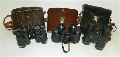 Lot 1040 - Three Cased Pairs of Binoculars - Leitz Trinovid 10 x 40B 110m/1000m, serial number 829130,...