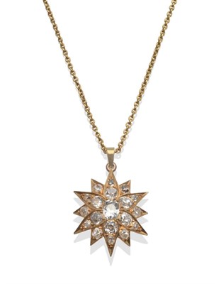 Lot 360 - A Diamond Star Pendant, set throughout with old cut diamonds, in yellow claws, total estimated...