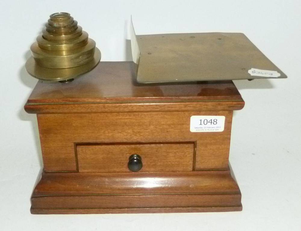 Lot 1048 - A Large Mahogany Parcel Scale by DeGrave Short & Co., London, with brass pans and with a set of...
