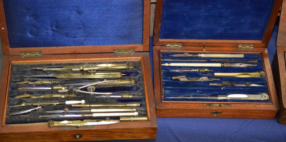 Lot 1056 - A Collection of Drawing Instruments, including two mahogany cased drawing sets, rules,...