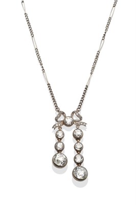 Lot 362 - ~ A Diamond Bow Motif Necklace, a white figaro link chain suspends a rose cut and old cut...