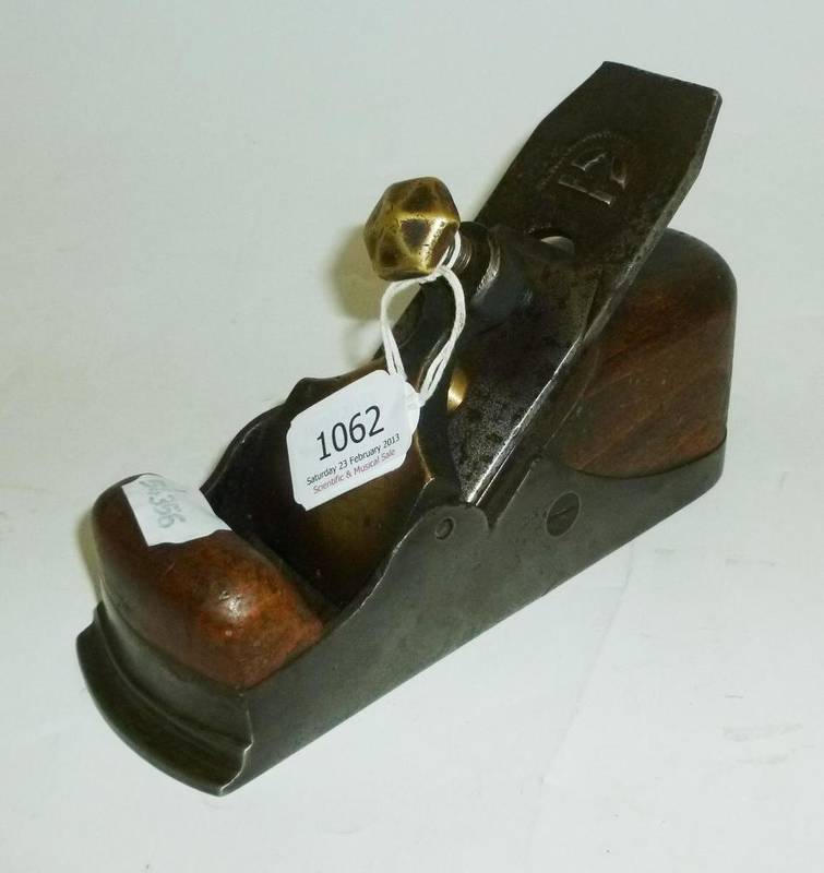 Lot 1062 - A Steel Smoothing Plane, with stepped front, beech infill, brass lever cap with hexagonal brass...