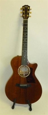 Lot 1087 - A Taylor 512 - CE - L10 Electro-Acoustic Guitar, serial number 20050916101, with solid mahogany...