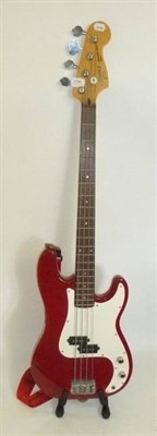 Lot 1100 - A Fender Squier Precision Bass Guitar, made in Korea, serial number S992998, with maroon...