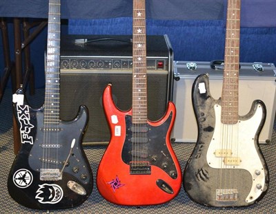 Lot 1109 - Three Electric Guitars - Starforce USA, in metallic red, Encore in black and Sunn Mustang bass...