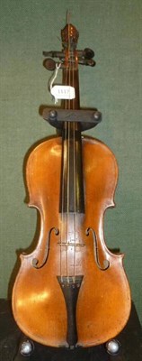 Lot 1117 - A 19th Century German Violin, no label, with a 357mm one piece back, the scroll carved as a...