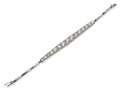 Lot 369 - ~ An Early 20th Century Diamond Bracelet, fifteen graduated old cut diamonds, in white...