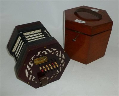 Lot 1136 - A Lachenal & Co Forty Eight Key English System Concertina, serial number 31382, with fretwork...
