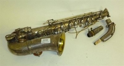 Lot 1143 - A Silver Plated Alto Saxophone by Boosey & Co., London, serial number 17102, with mouthpiece,...