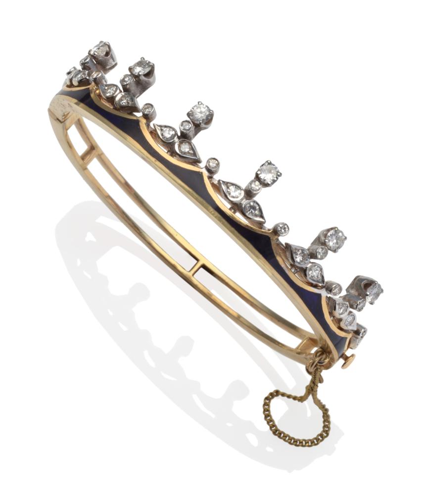 Lot 371 - ~ A Coronet Bangle, set with round brilliant cut and eight-cut diamonds, with dark blue enamel...
