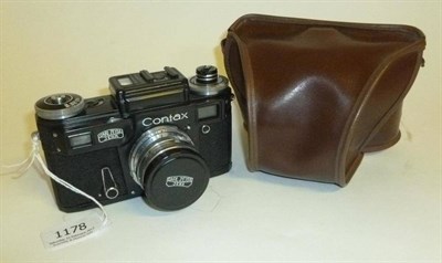 Lot 1178 - A New Copy of a Carl Zeiss Contax IIIA Camera, with black enamelled body, Sonnar f2/50mm lens, lens