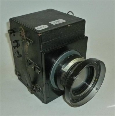 Lot 1187 - A Kershaws Patent Reflex Camera, with black leather covered wooden body, the folding viewing...