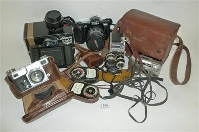 Lot 1190 - Cameras and Accessories, including a Zeiss Ikon Contax II camera No.J12819 in a stitched...