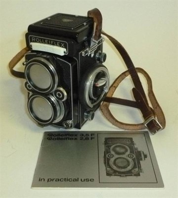 Lot 1196 - A Rolleiflex 2.8F Twin Lens Reflex Camera, serial number 2478868, with black leather covered...