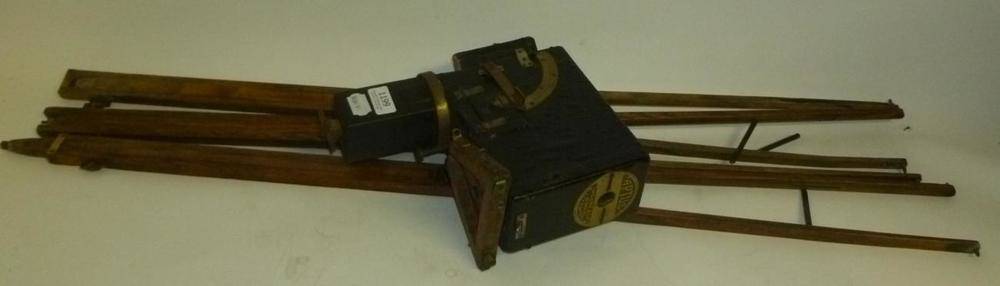 Lot 1199 - An 'Aptus' Ferrotype Camera by Moore & Co, Liverpool, with black leather covered wooden body,...